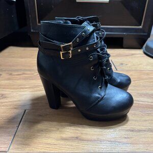 Heeled black boots